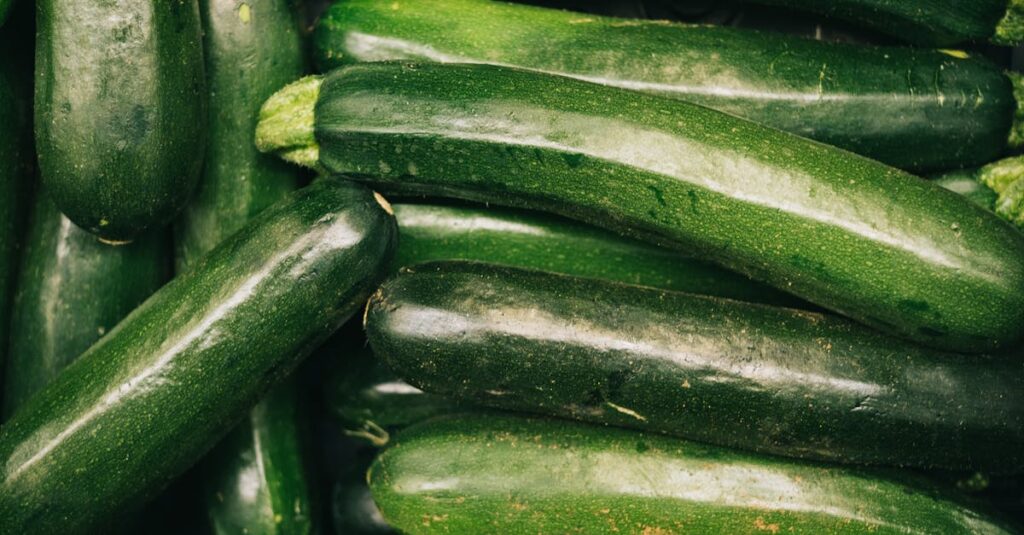 A detailed close-up of fresh green zucchini showcasing their organic quality and nutrition.